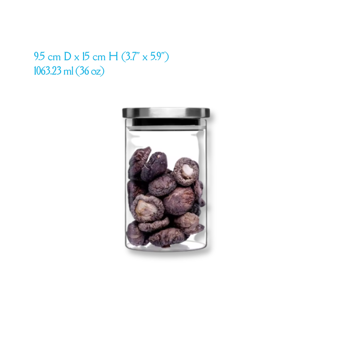 A set of round glass jars in various sizes with a airtight stainless steel lid, displaying different quantities of dry food items like pasta and beans.