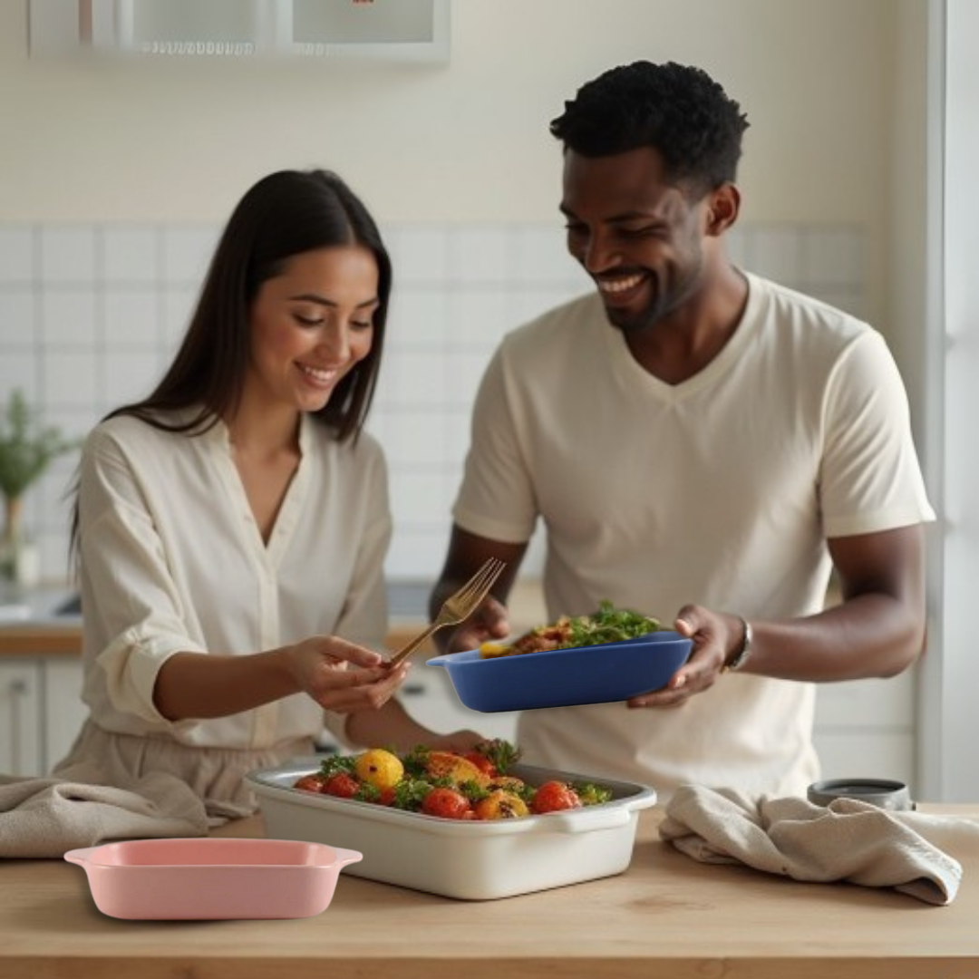 A couple in a kitchen preparing food together.
