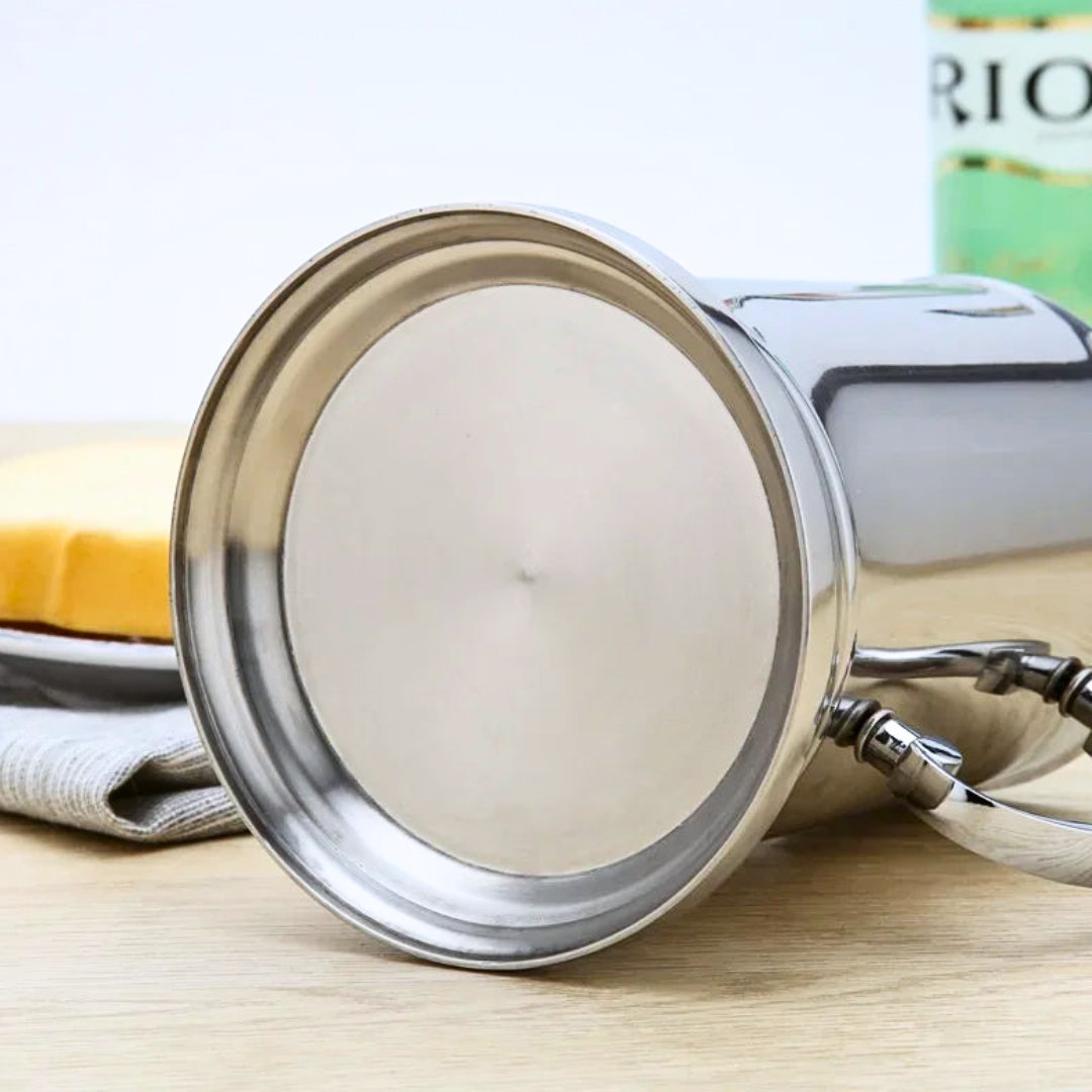 Close-up of a silver stainless steel mug