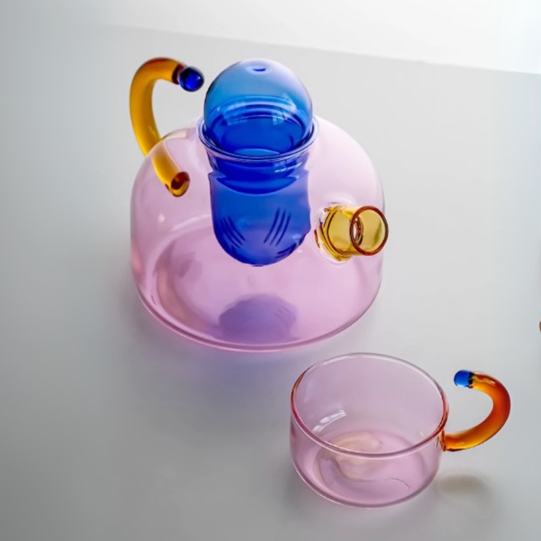 Pink glass teapot and a matching mug